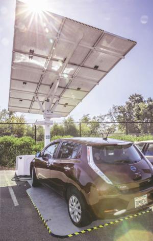 Car underneath solar panel